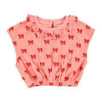 Pink terry top with red bows