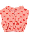 Pink terry top with red bows