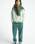 Green striped trousers
